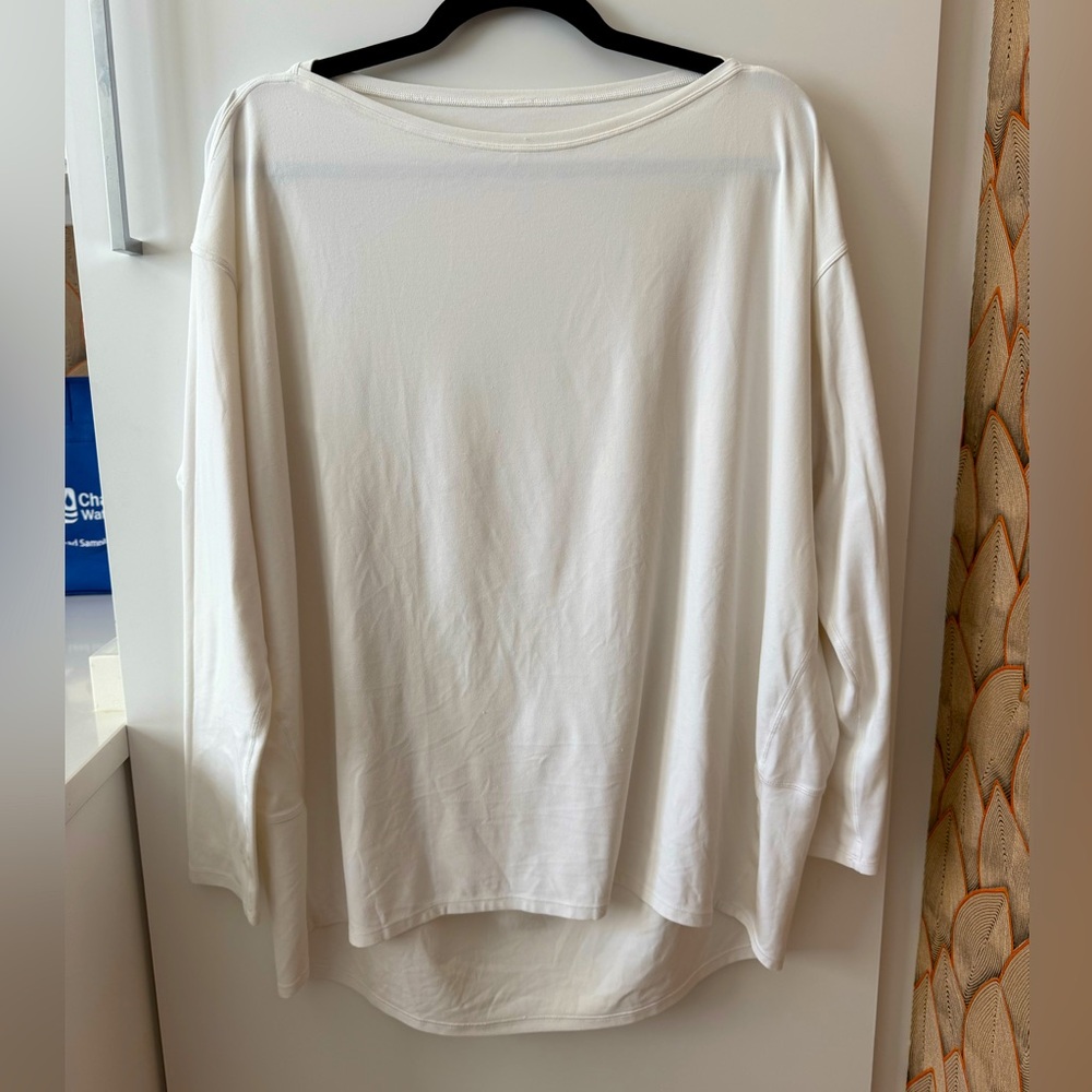 “Back in Action” Lululemon white long sleeve shirt, size 10